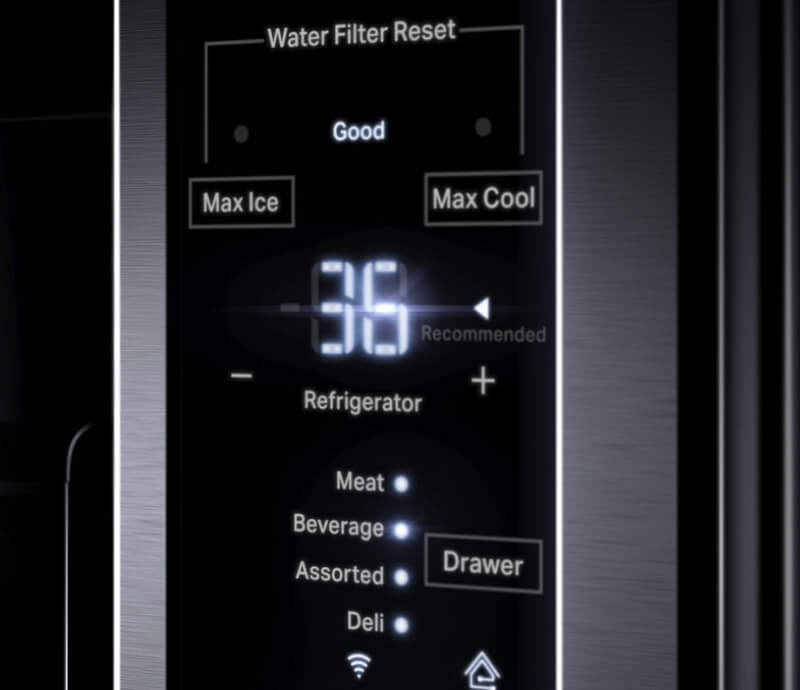 The touch controls on the exterior of a freestanding refrigerator.