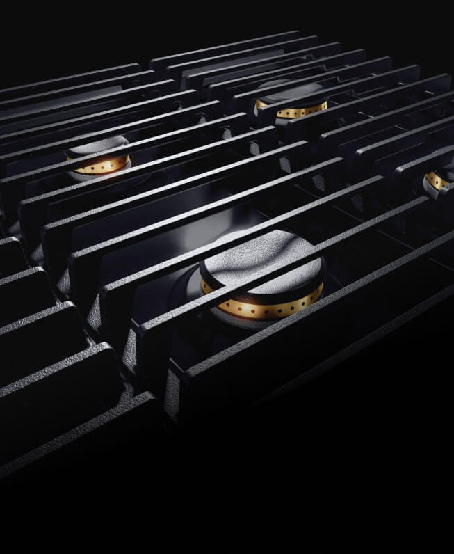 The grates on a JennAir® NOIR™ Professional-Style Range.