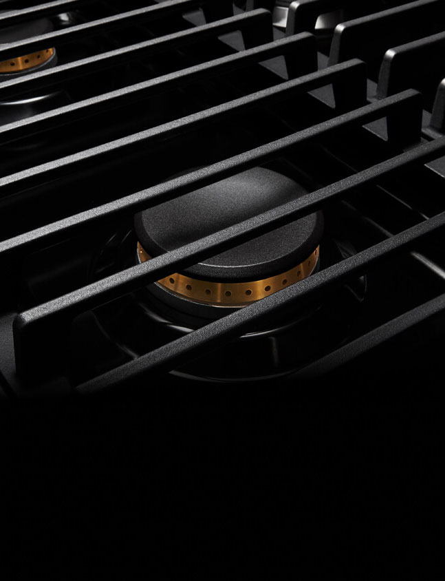 The grates on a JennAir® NOIR™ Rangetop.