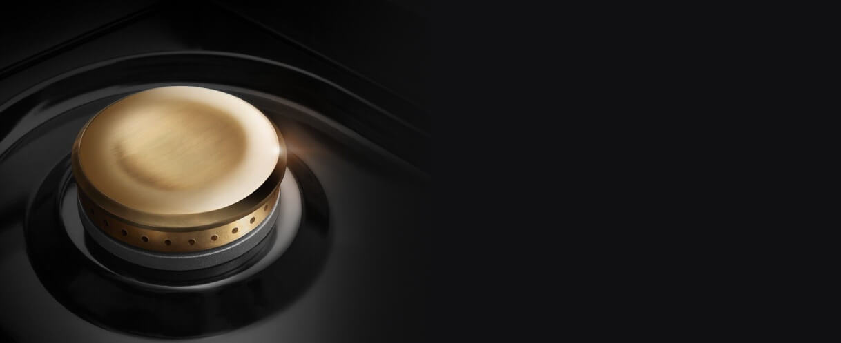 Closeup of a Dual-Stacked PowerBurner with a brass burner cap.