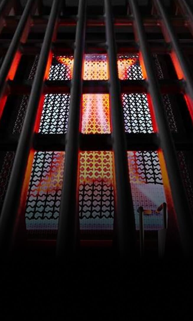 The cast iron grill section of a gas rangetop.