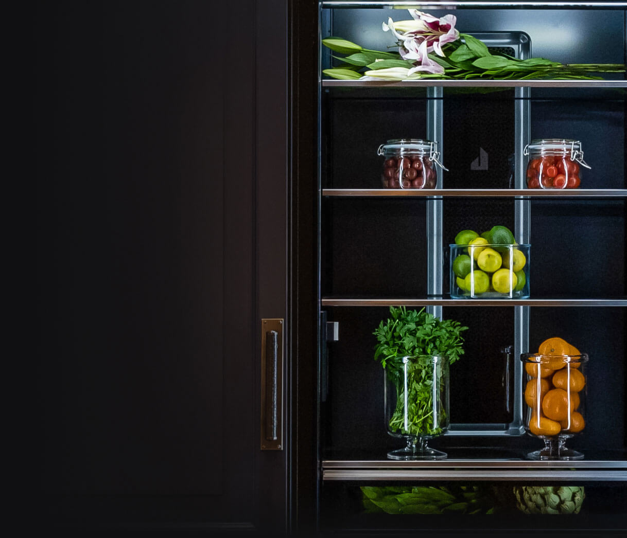 A refrigerator filled with vibrant fruits and vegetables.
