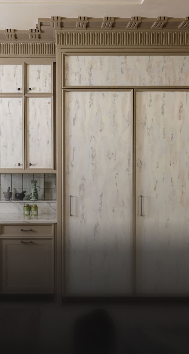 A beautiful transitional kitchen fitted with panel-ready JennAir® appliances.