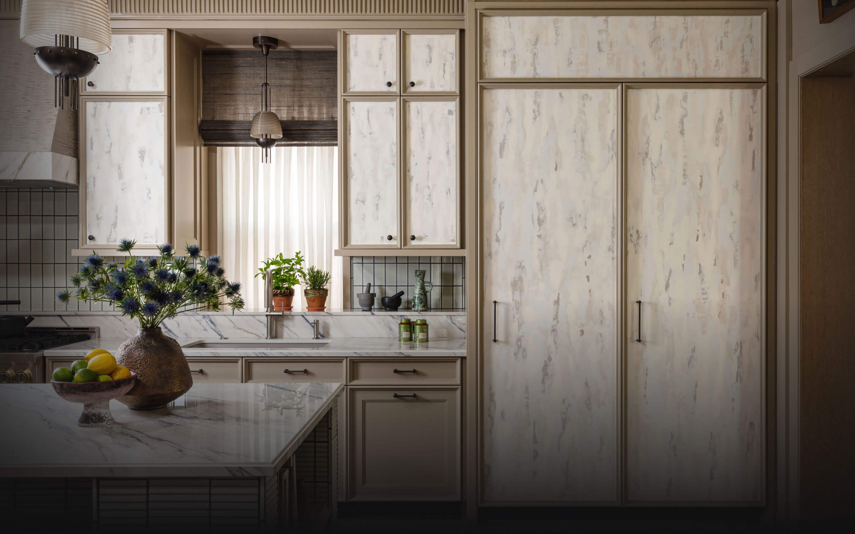 A beautiful transitional kitchen fitted with panel-ready JennAir® appliances.