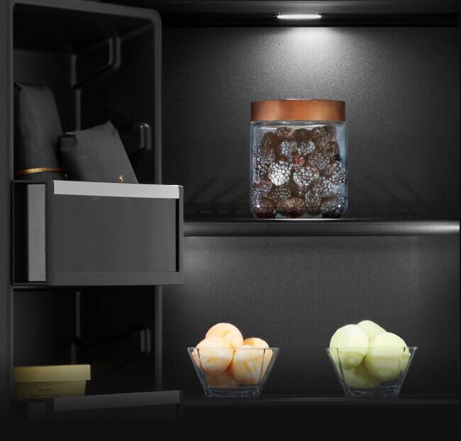 A close up on the shelves and door bins of an Obsidian interior refrigerator.