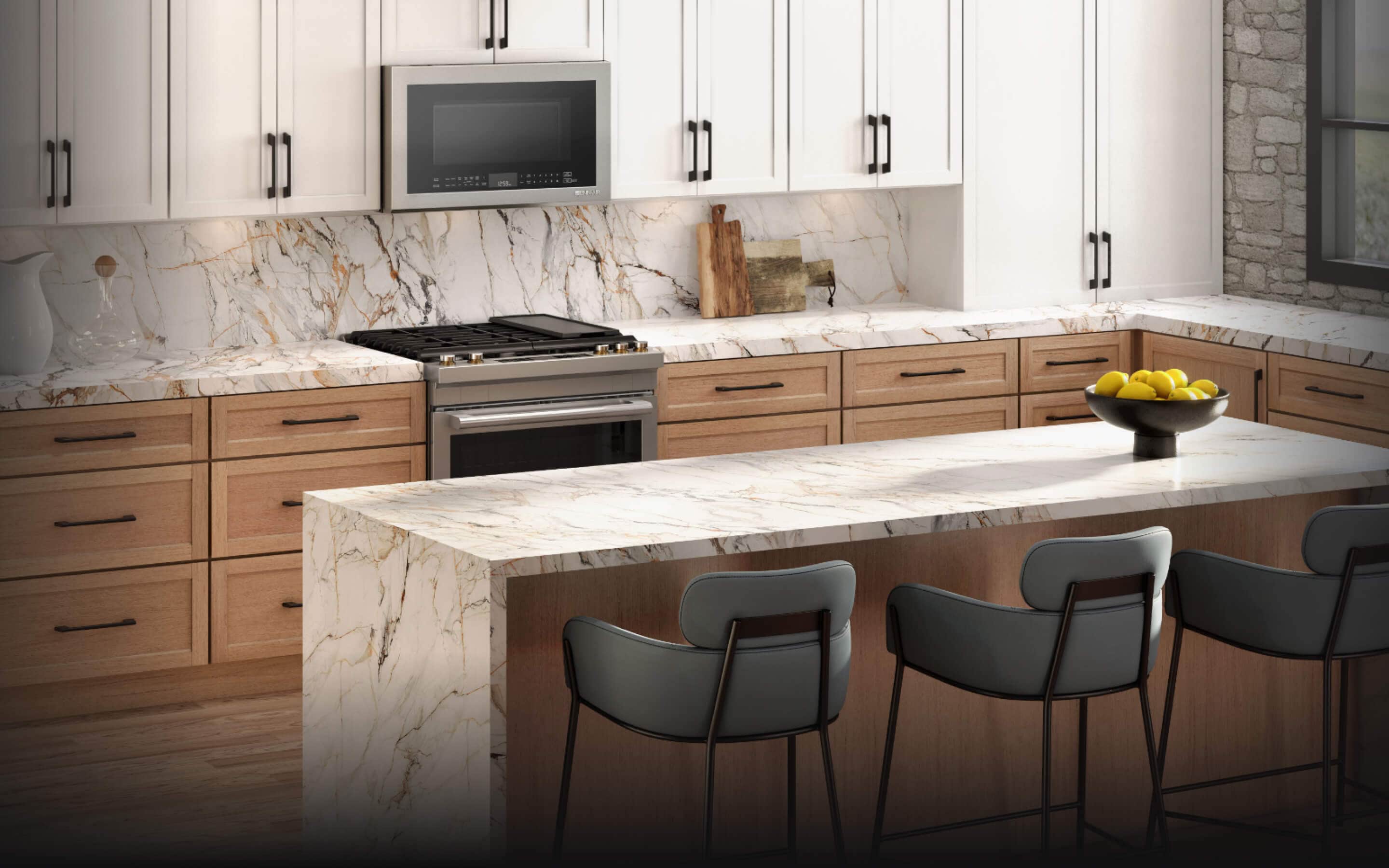 A JennAir® RISE™ Slide-In Range in a high-end kitchen.
