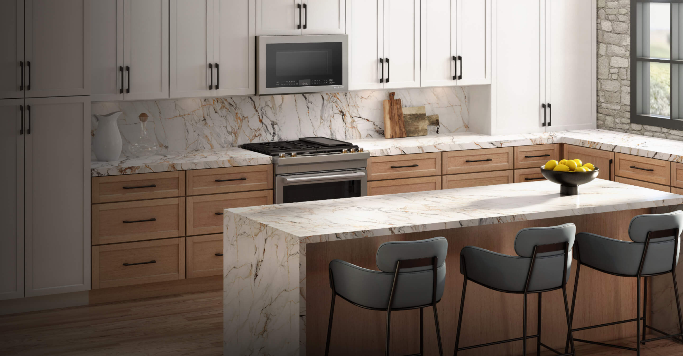 A bright modern kitchen featuring a suite of JennAir® appliances and a slide-in range. 