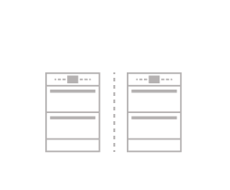 An icon of two wall ovens divided by a dashed line.