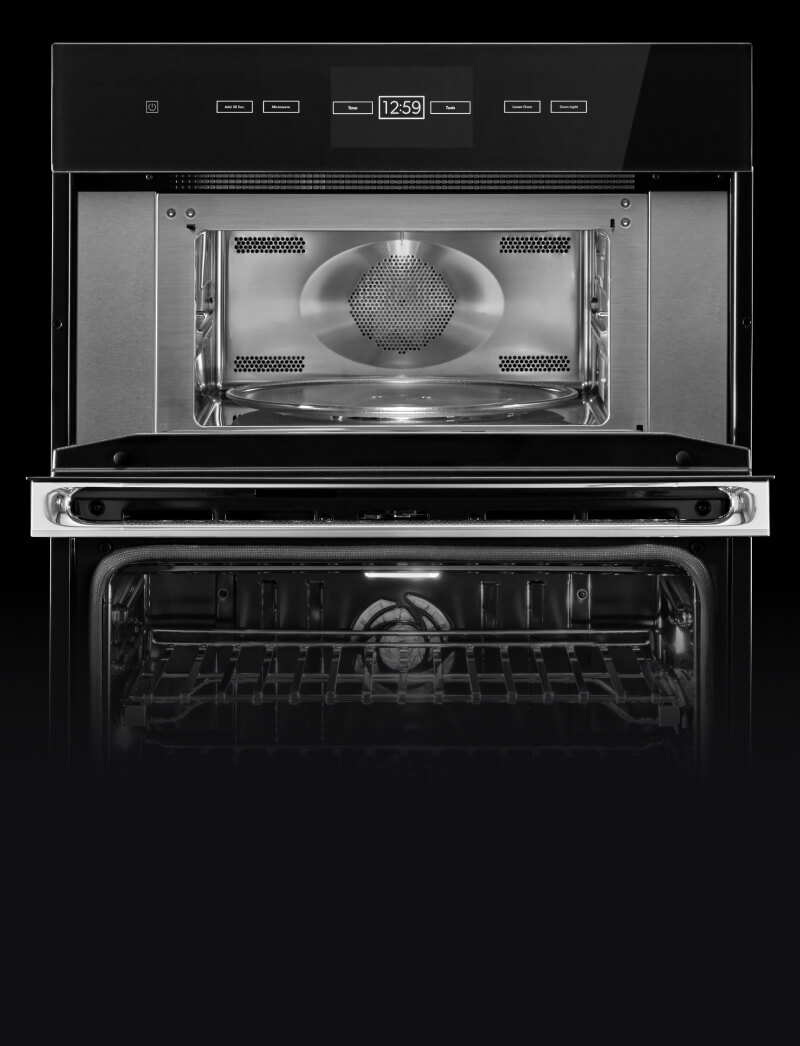 The stainless steel interior of a microwave.