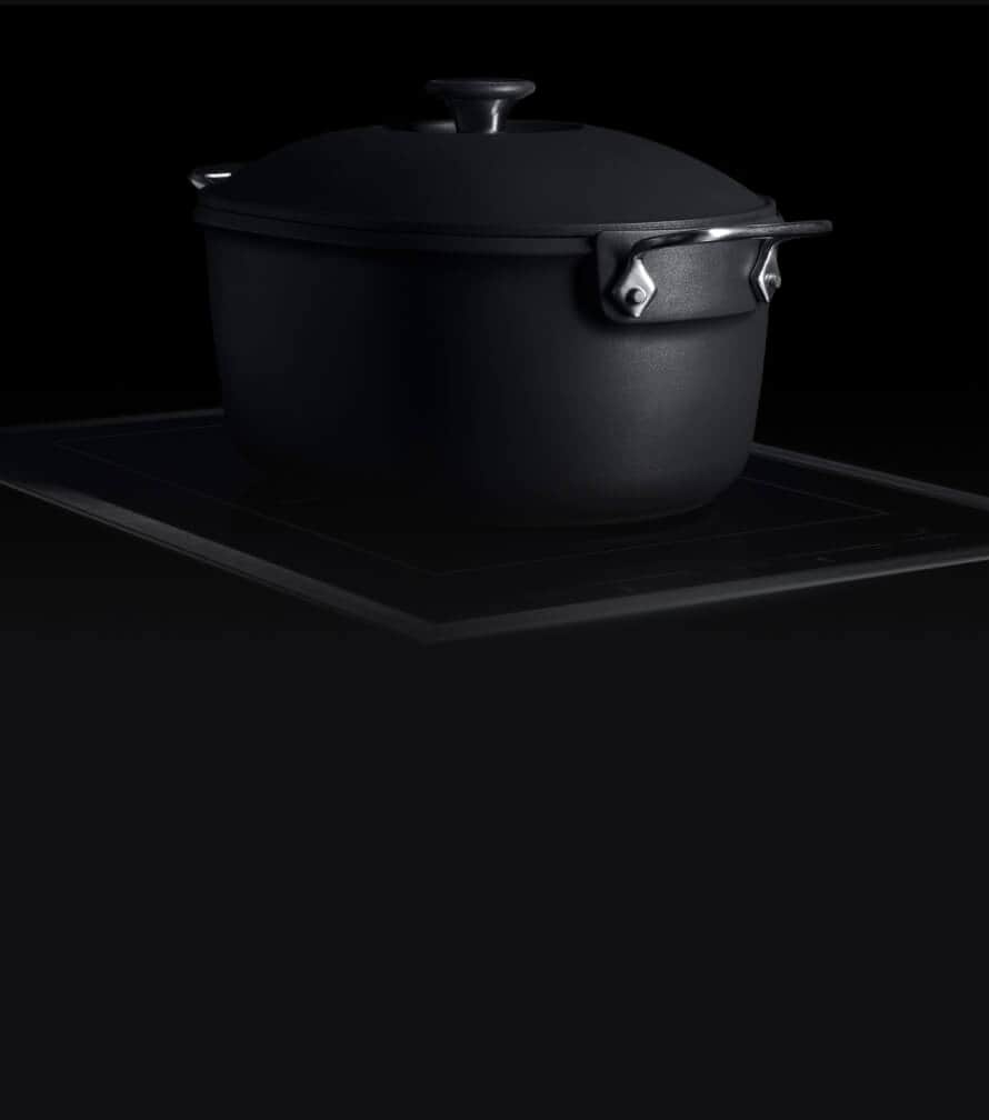 A JennAir 15-inch Induction Flex Cooktop with a cast-iron dutch oven.
