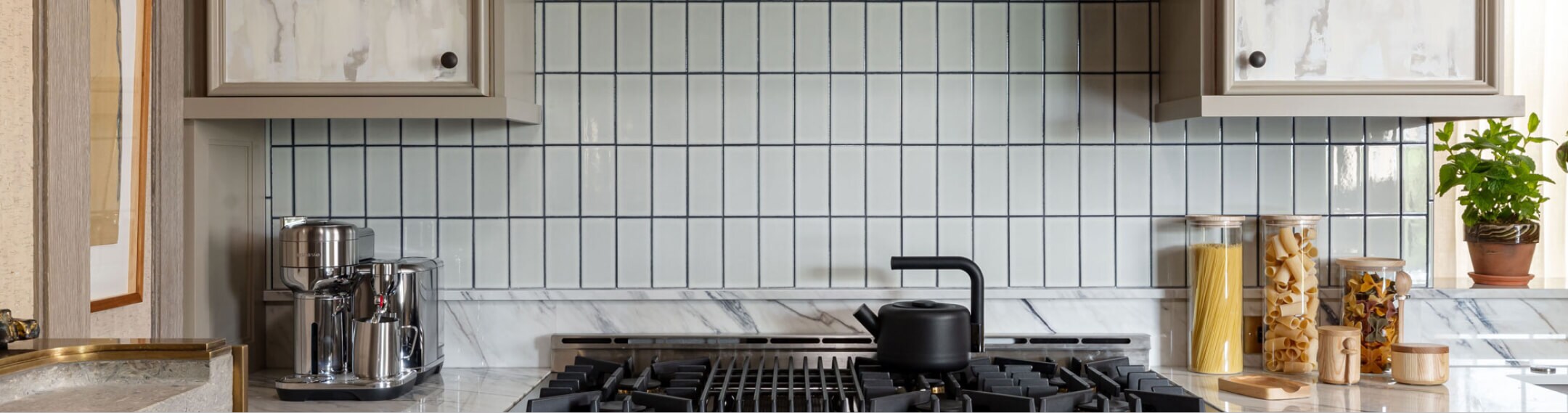 A JennAir® Rangetop installed in a stylish kitchen.