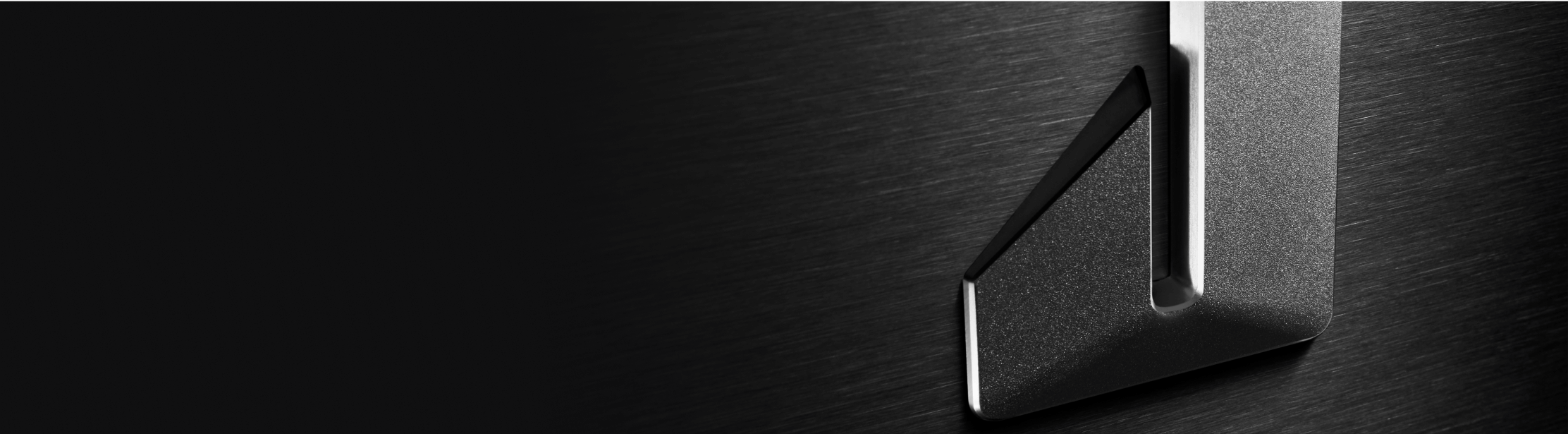 The JennAir Defiant J badge.