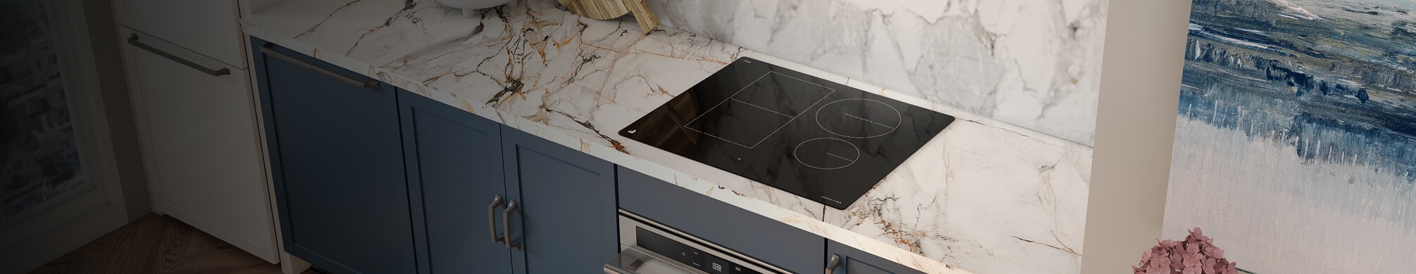 A JennAir® 30-inch induction cooktop in a luxury kitchen