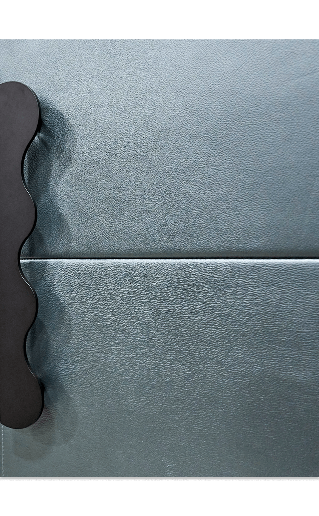 A close up of the texture of the new limited edition leather Cuts panel, Mystic, fitted with a custom handle in black.