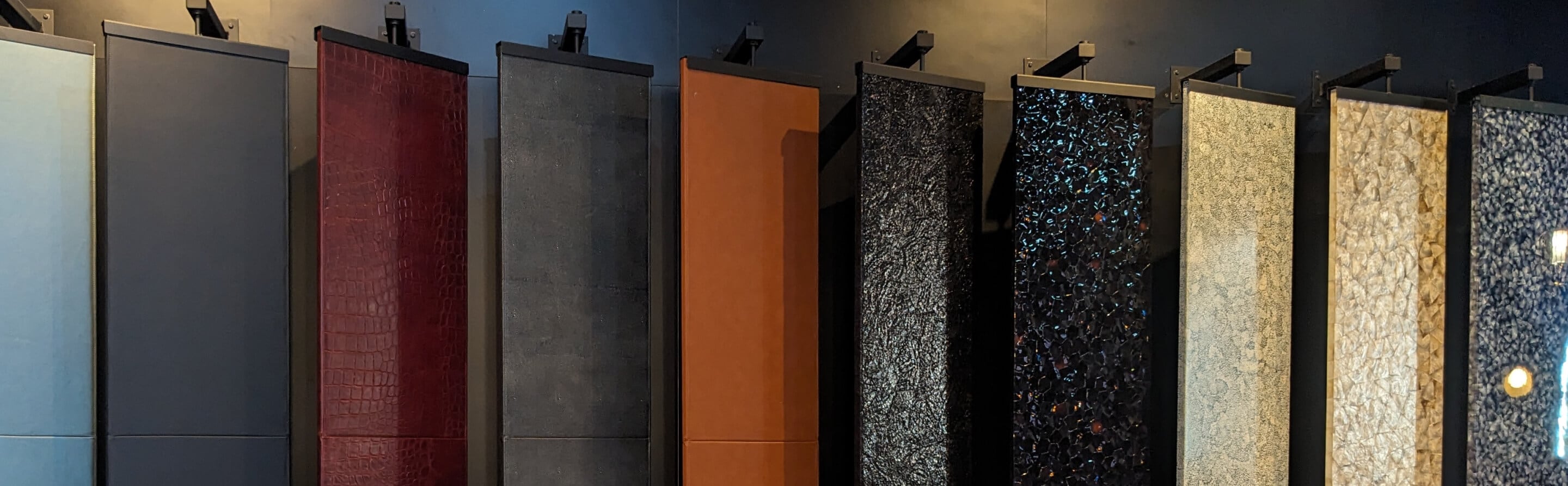 A collection of the Elements and Cuts Column Panels hanging together at the KBIS 2025 booth.