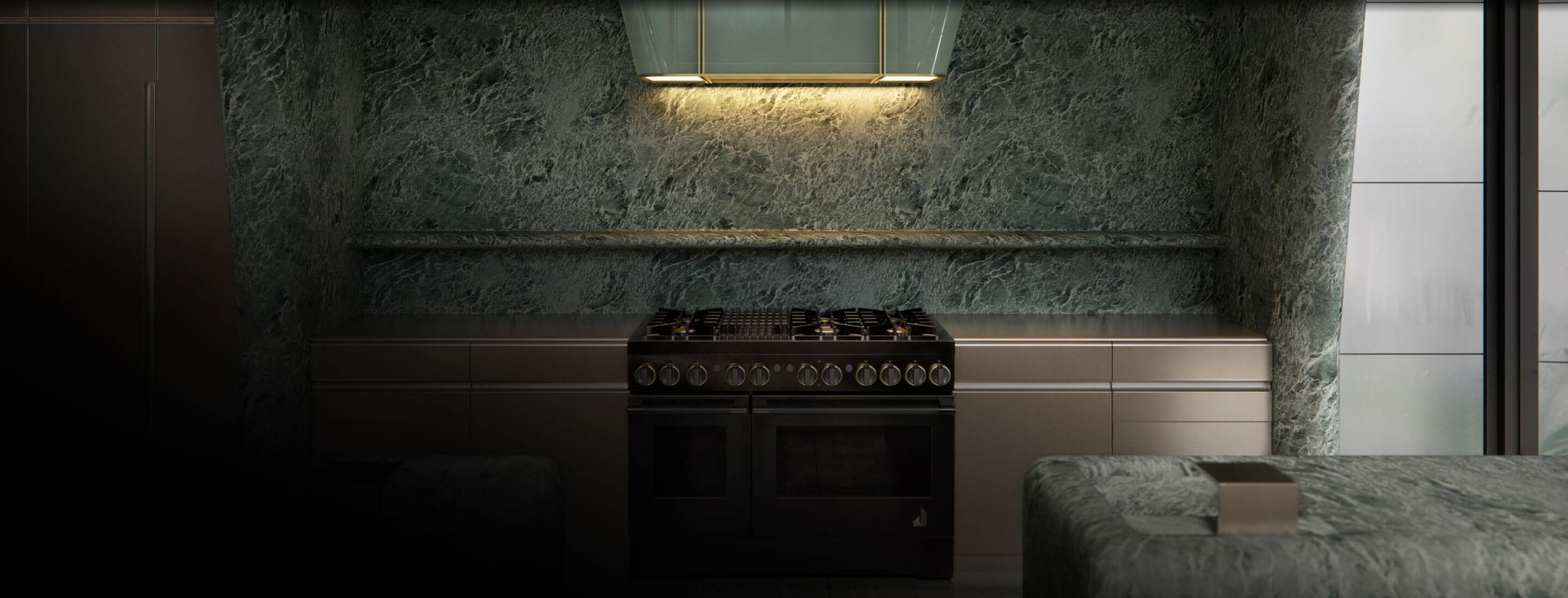 The kitchen designed by Kelly Wearstler in shades of subdued green.