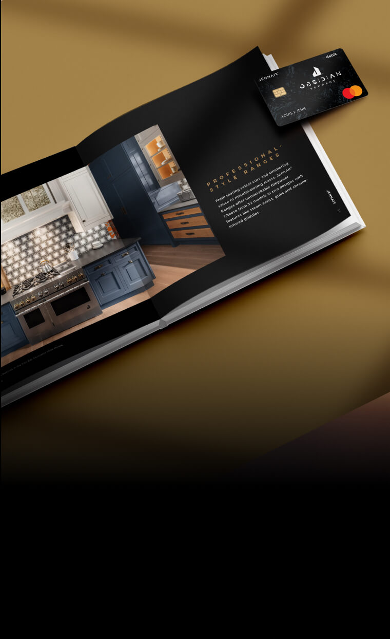 An open JennAir® lookbook on a brass background.