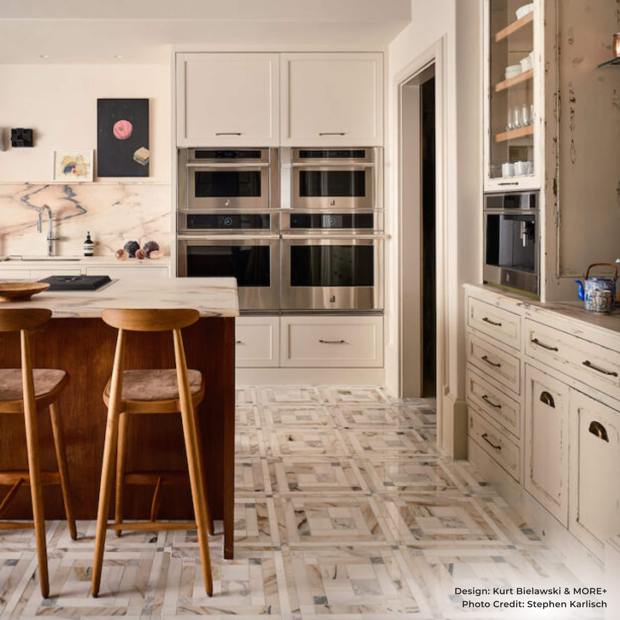A luxury contemporary kitchen in the Kips Bay House in Dallas, featuring JennAir appliances.
