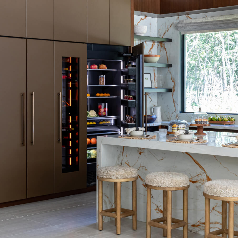 A luxury kitchen featuring JennAir appliances.