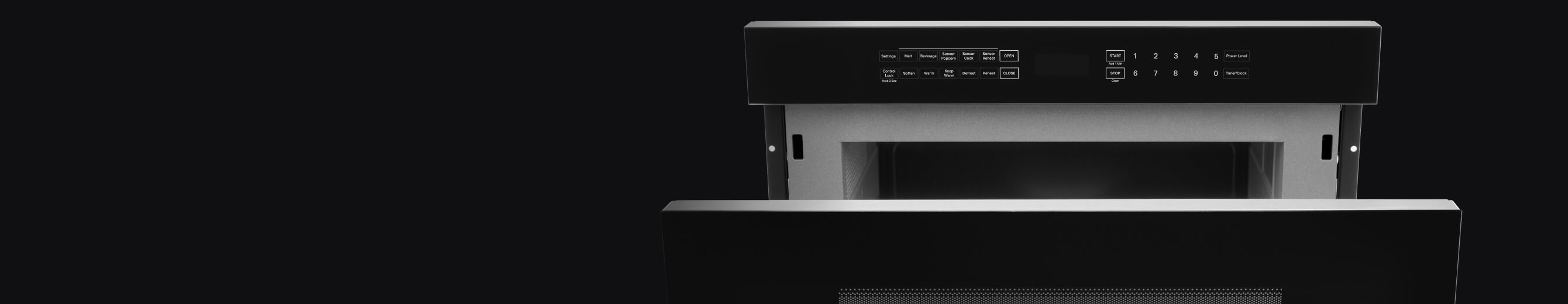 A JennAir® Built-In Microwave with the door partially open.