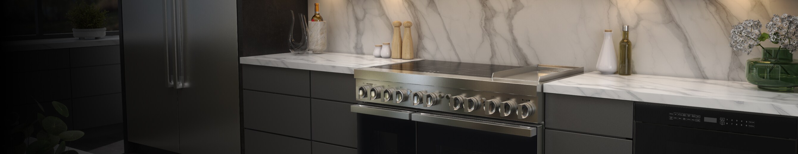 A JennAir® NOIR™ Induction Range with an electric griddle.