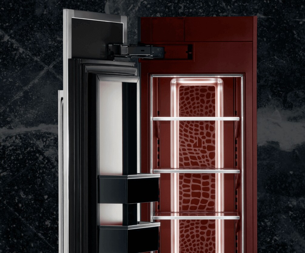 An open freezer column on an icy background.