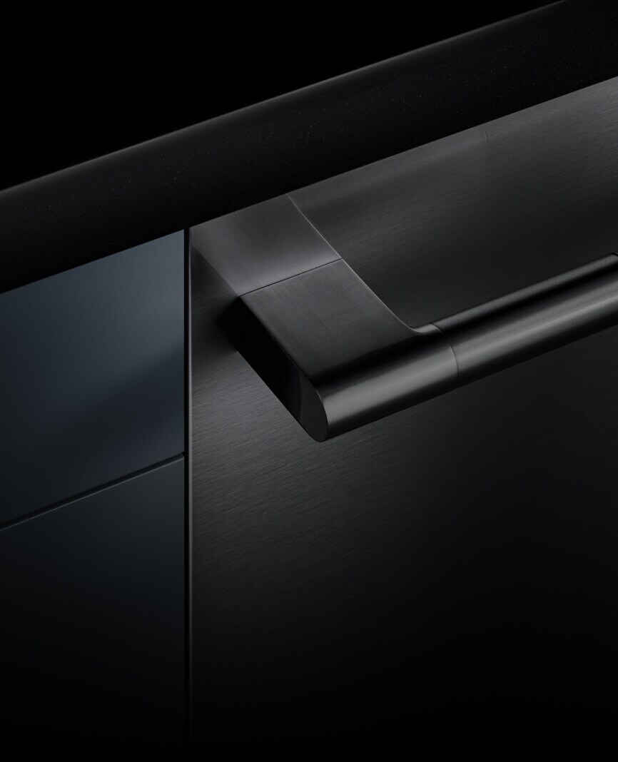 The front of a dishwasher, showing the flush and fully integrated design against the cabinetry.