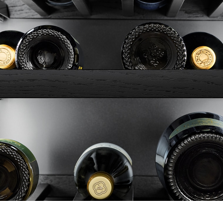 The interior of the wine column, showing bottles.