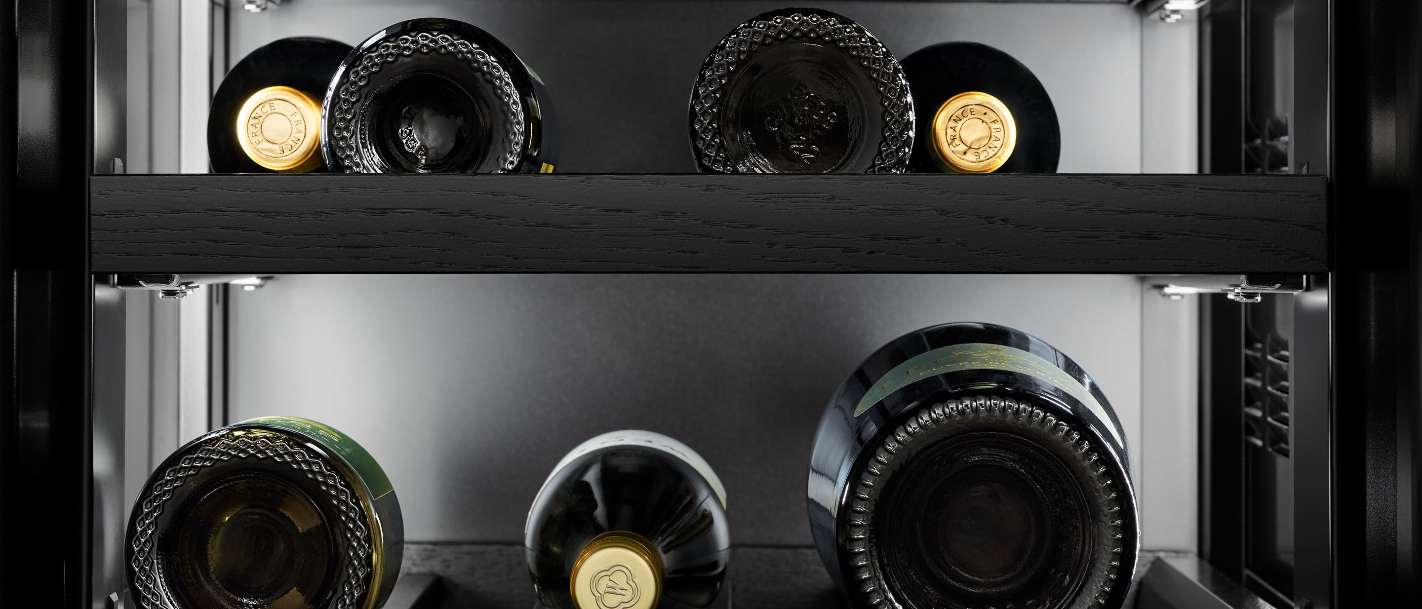 The interior of the wine column, showing bottles.