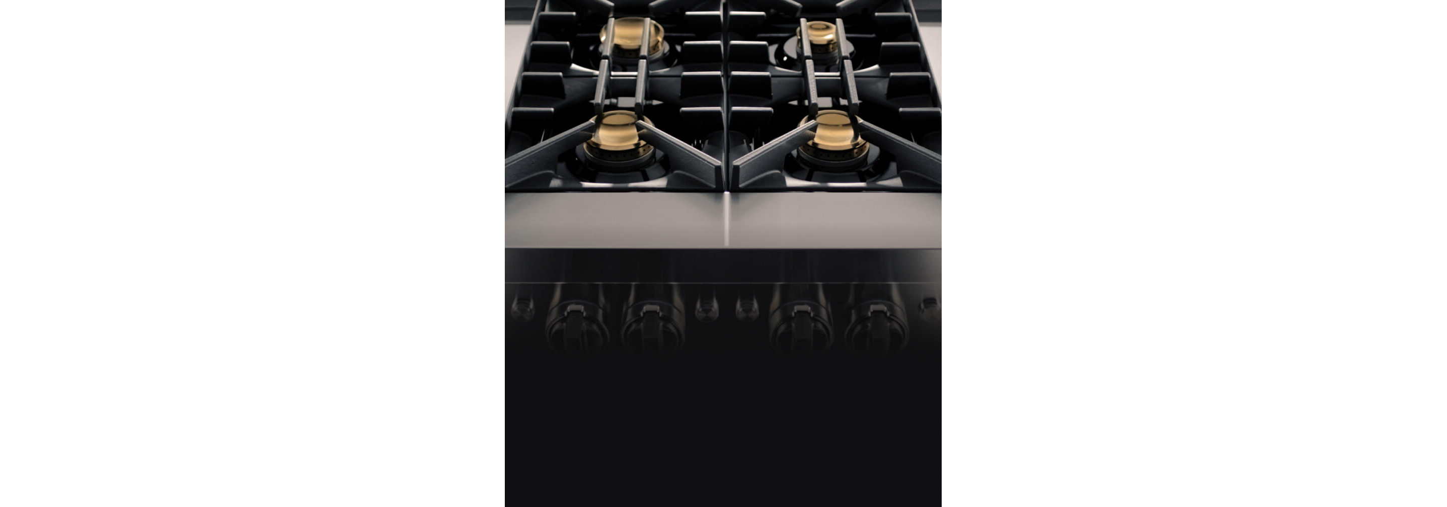 A RISE™ Range with brass burner caps.