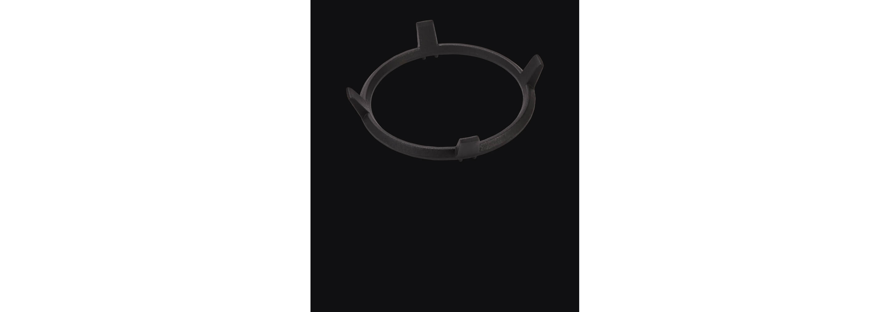 A wok ring isolated on a black background.