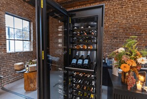 A JennAir® Wine Column stocked with assorted wine