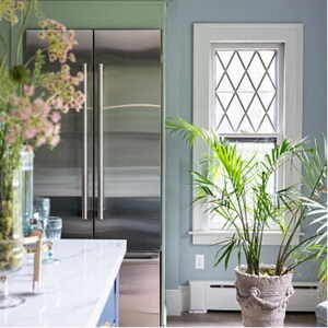 A JennAIr® Built-In refrigerator installed in the kitchen