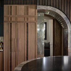 A paneled refrigerator in the kitchen