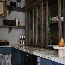 A glass case in a kitchen