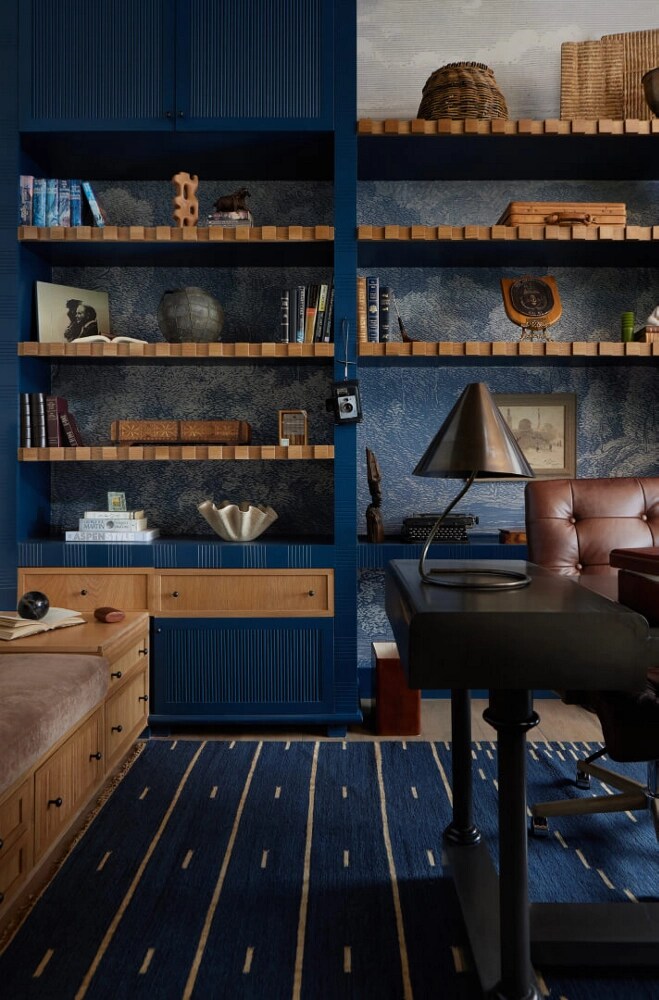 A royal blue office with warm wood accents
