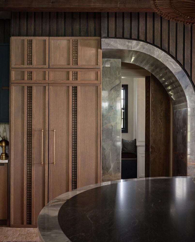 A paneled refrigerator in the kitchen