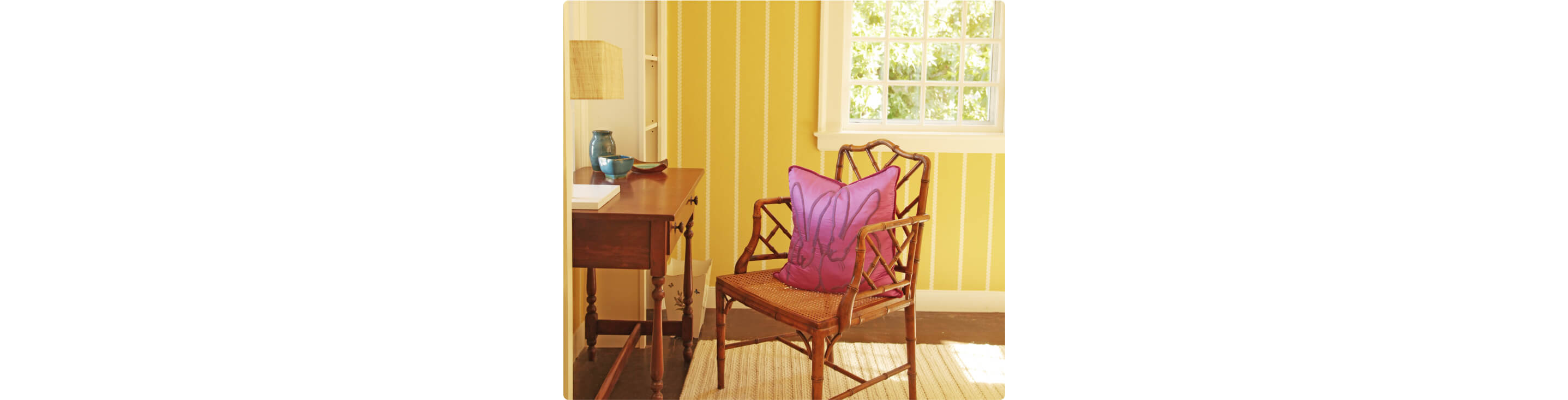 The desk and chair in the yellow bedroom. 