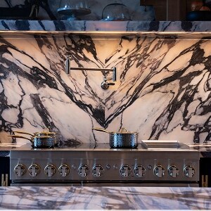 The marble backsplash above the JennAir® Professional-Style Induction Range