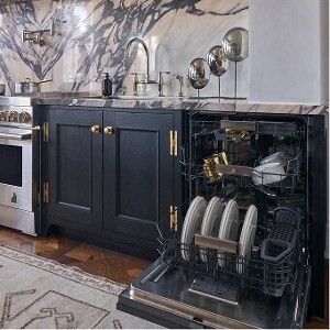 An open JennAir® Dishwasher installed in a kitchen