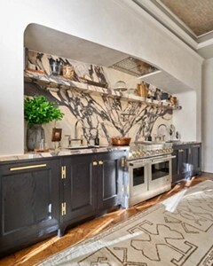 A JennAir® Professional-Style Induction Range installed in the kitchen