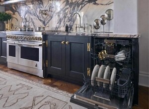 An open JennAir® Dishwasher installed in a kitchen