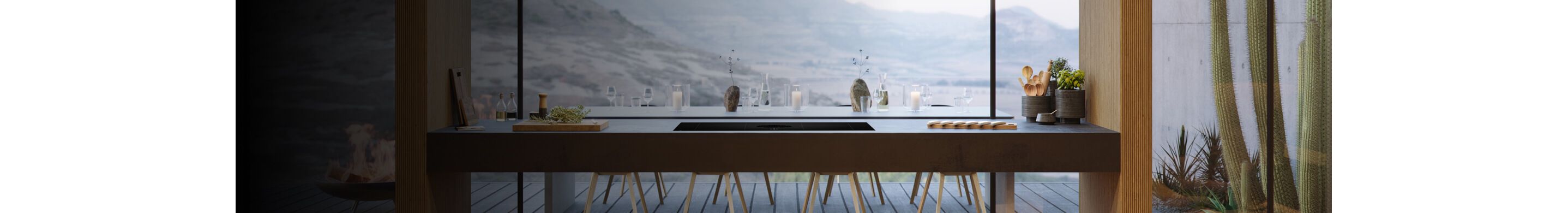 A JennAir® 30-inch induction downdraft cooktop in a luxury kitchen.