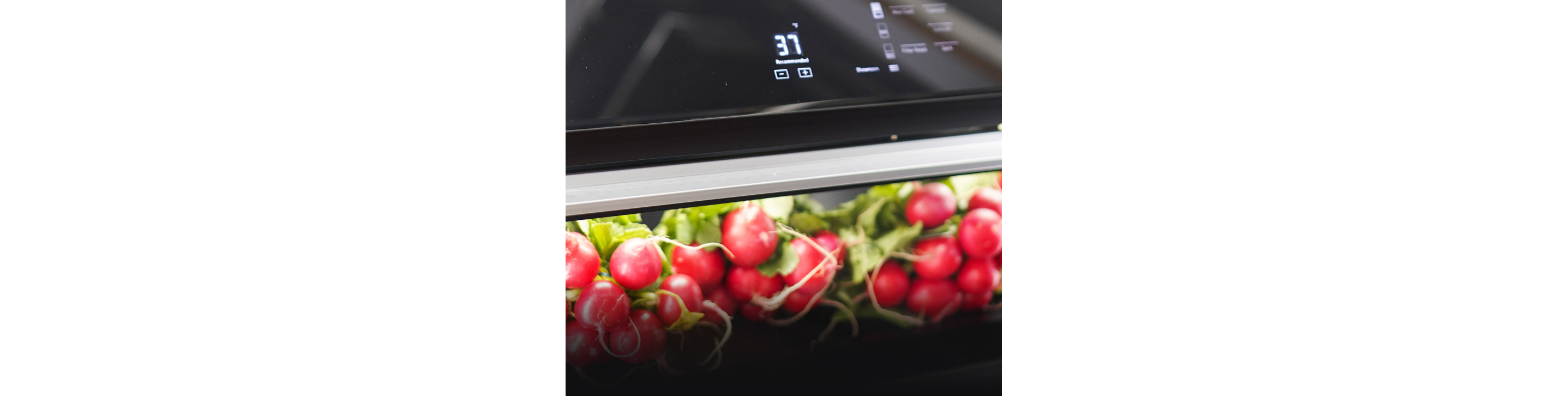 Whole radishes inside of a Column Refrigerator drawer.