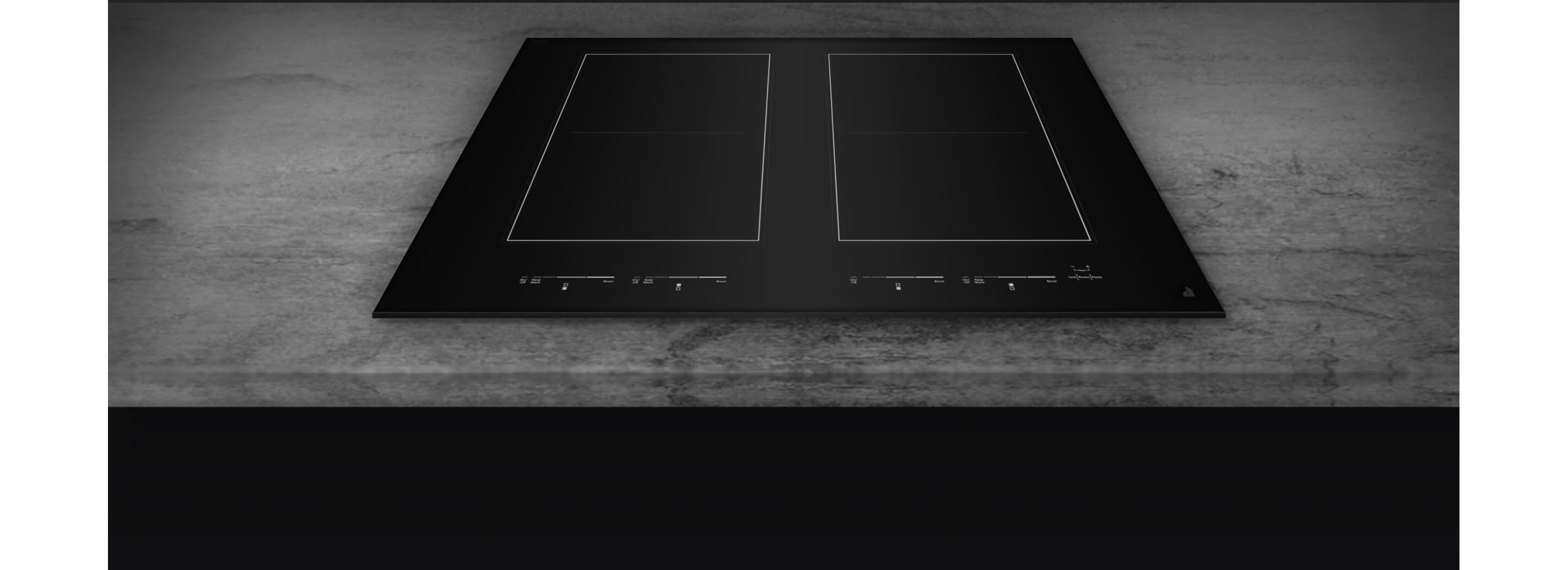 A closeup of the black glass surface of a cooktop.