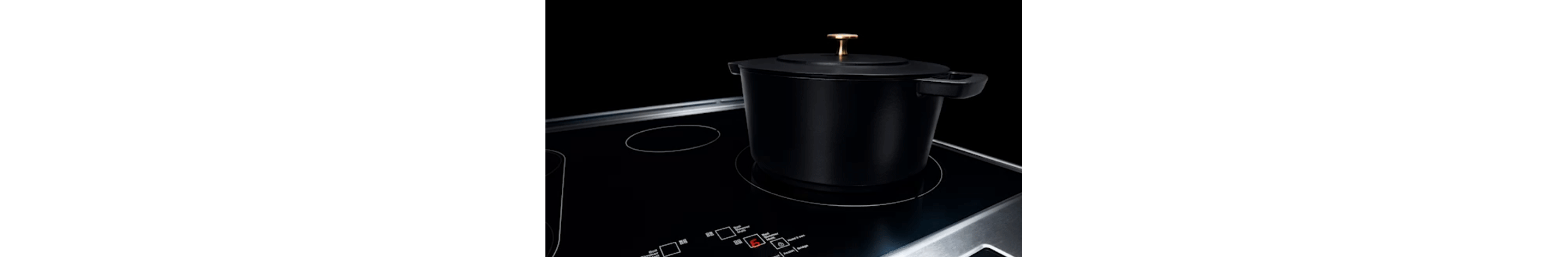 A black pot on an induction cooktop.