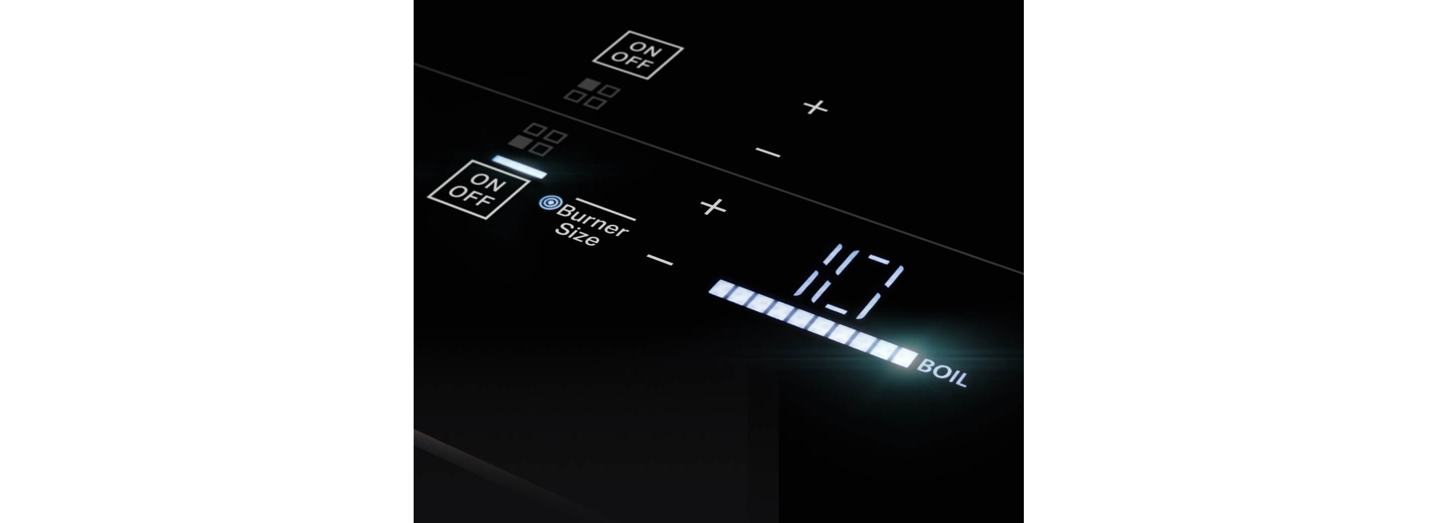 Closeup of lit emotive controls on a cooktop.