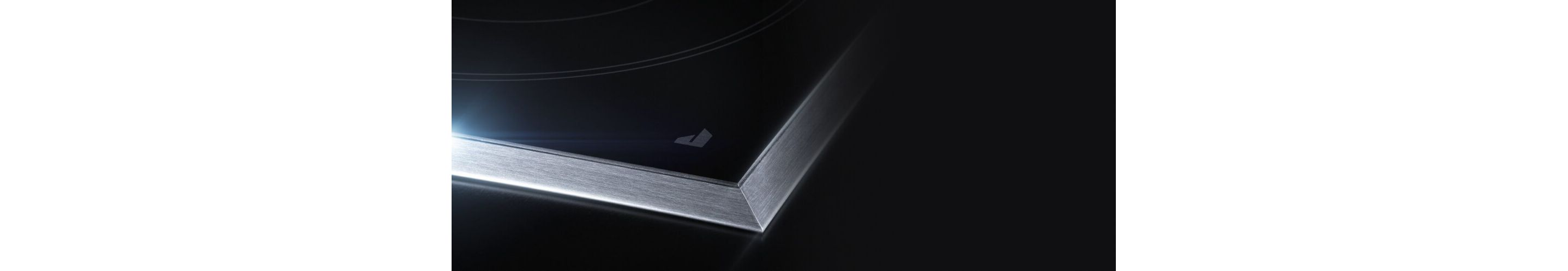 Closeup of the shining cooktop surface.