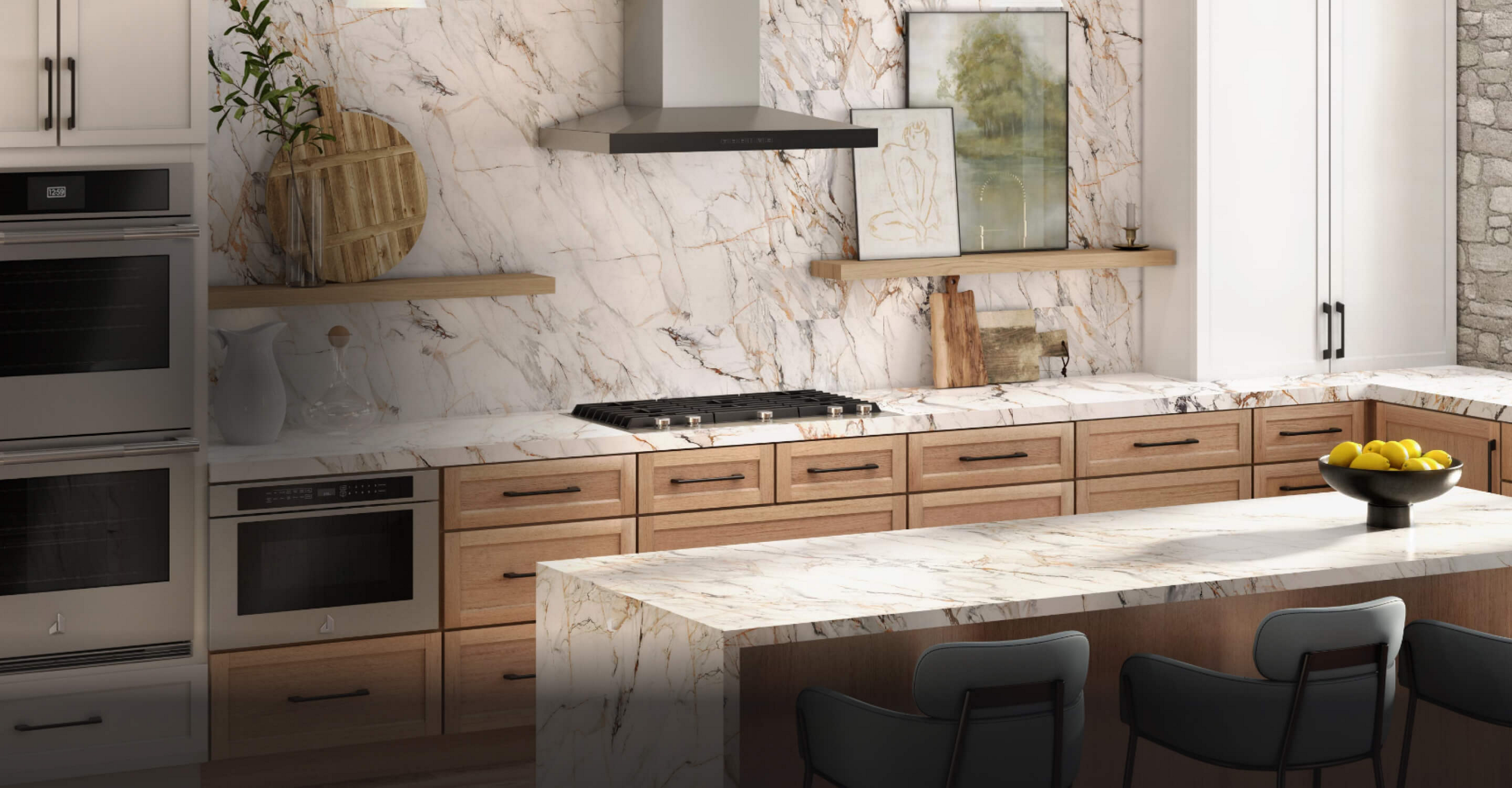 A high-end luxury white marble kitchen featuring JennAir® appliances.
