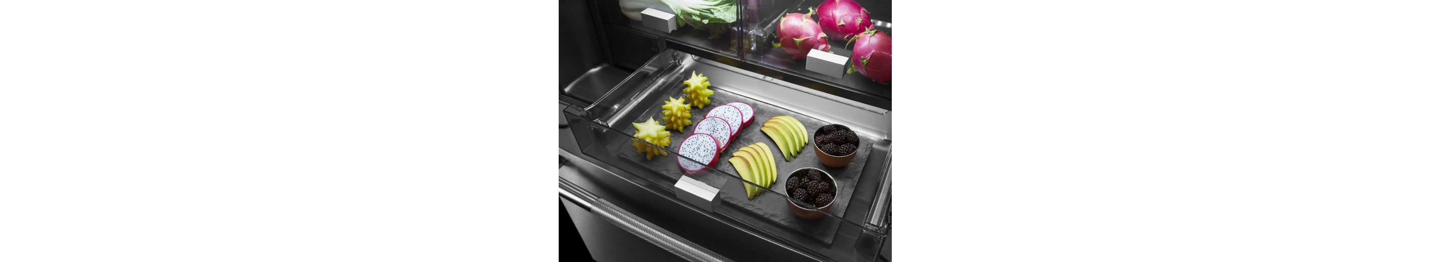 A close up on the shelves and door bins of an Obsidian interior refrigerator.